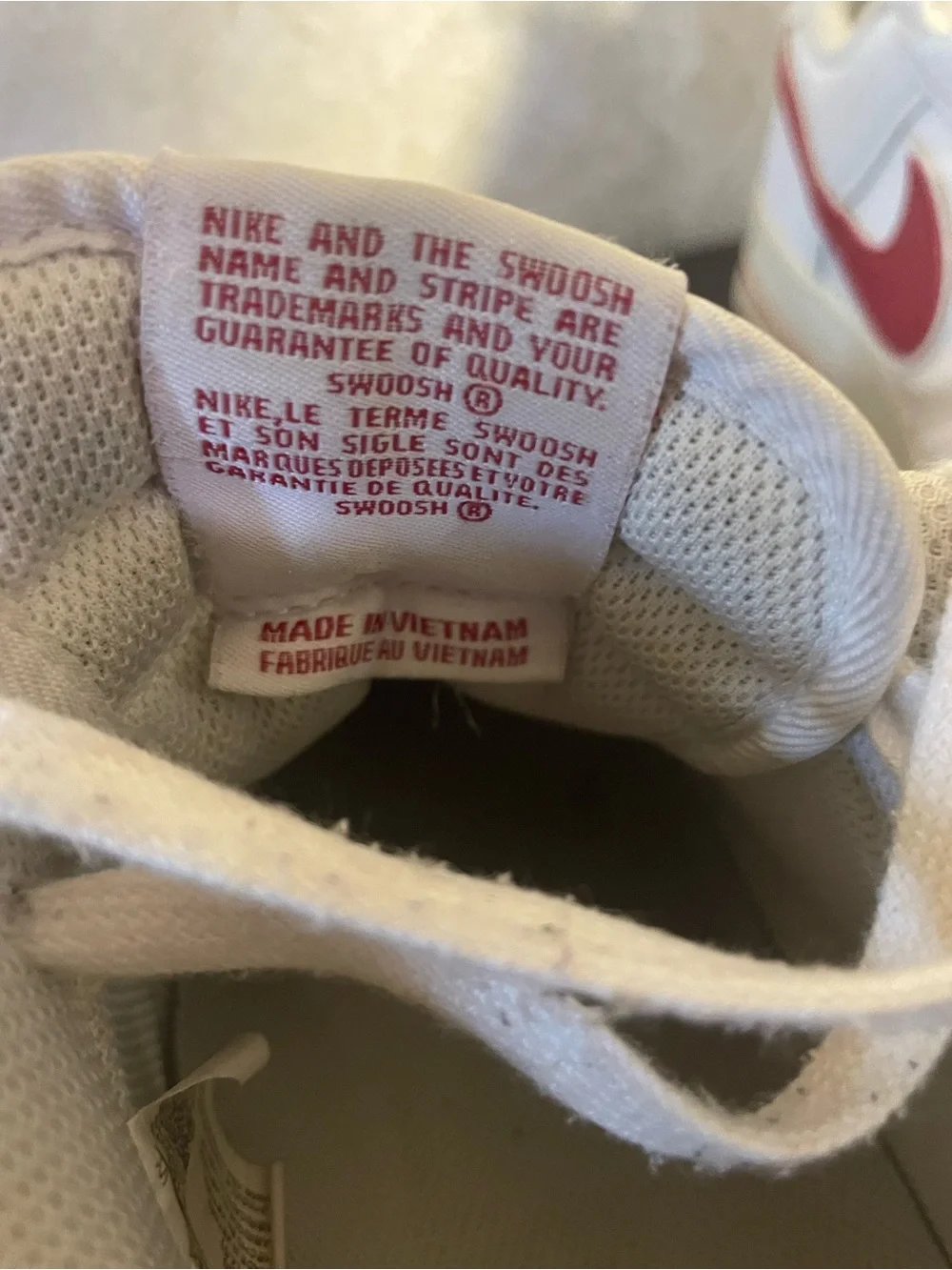 Nike Air Force 1 All-White Low Top Sneakers with Red Swoosh